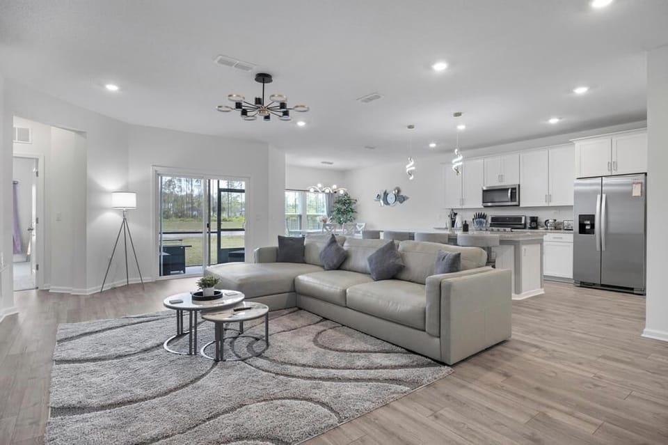 Spacious living & dining area w/ an open layout perfect for gathering.