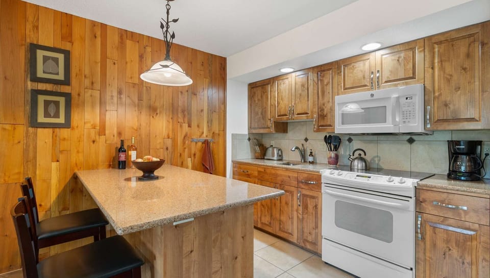 Granite slab countertops in kitchen.