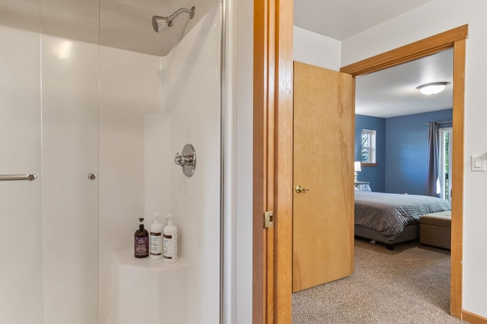 King private on suite bath with dual sinks and shower – upper level.
