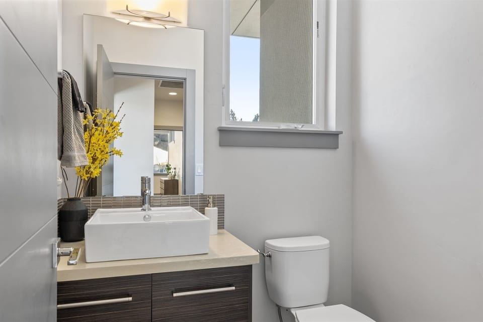Upstairs main level half bath.