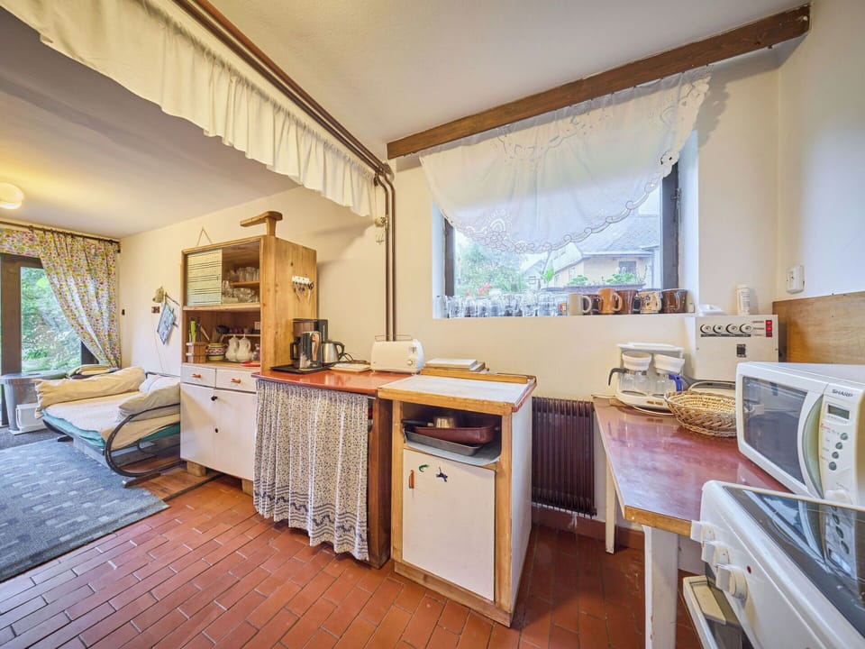 Furniture, Wood, Interior Design, Room, Flooring, Ceiling, Floor, Lighting, Home, Chair