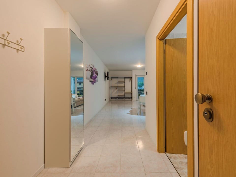 Flooring, Floor, Wall, Interior Design, Wood, Ceiling, Lighting, Apartment, Door, Room