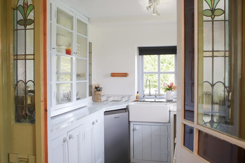 Kitchen with original features overlooking the Abbey