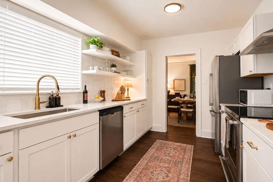 This is the kitchen that ends up deciding someone's making breakfast for the whole crew, with a stainless range, open shelves, and counter enough for two cooks who aren't colliding.
