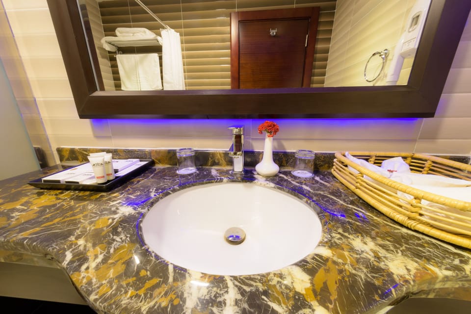 Shower, free toiletries, hair dryer, slippers