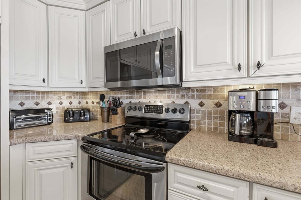Condo, Multiple Beds, Balcony (Errol by the Sea 521) | Private kitchen | Fridge, microwave, oven, stovetop