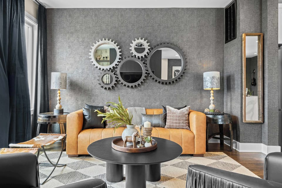Chic Living Room with Fireplace and Views of the City