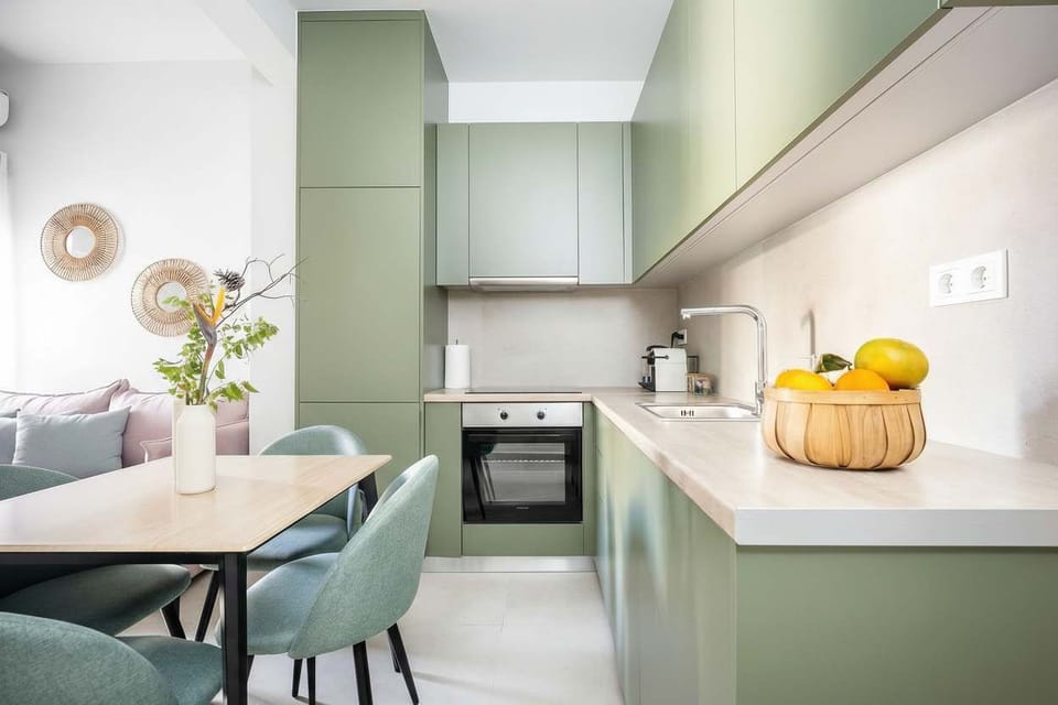 Prepare meals with ease in a fully equipped kitchen featuring generous counter space, modern appliances, and a bright, clean layout.