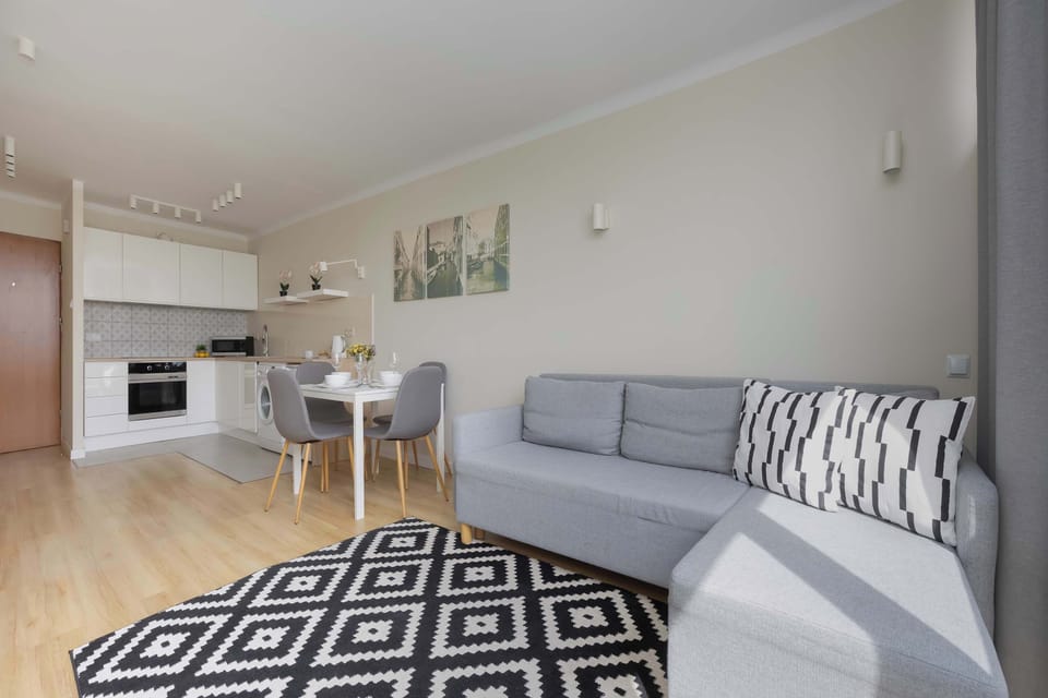 Spacious open-plan living area connected to the kitchenette, providing a functional layout and a welcoming environment for everyday living.