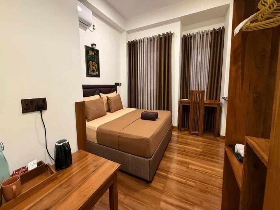 Deluxe Double Room, Balcony, Garden View | Laptop workspace, free WiFi