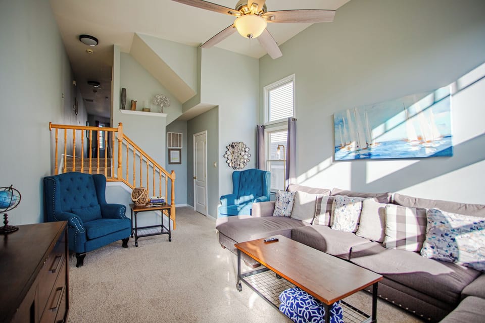 Spacious living area with large sofa couch perfect for sleeping multiple people!