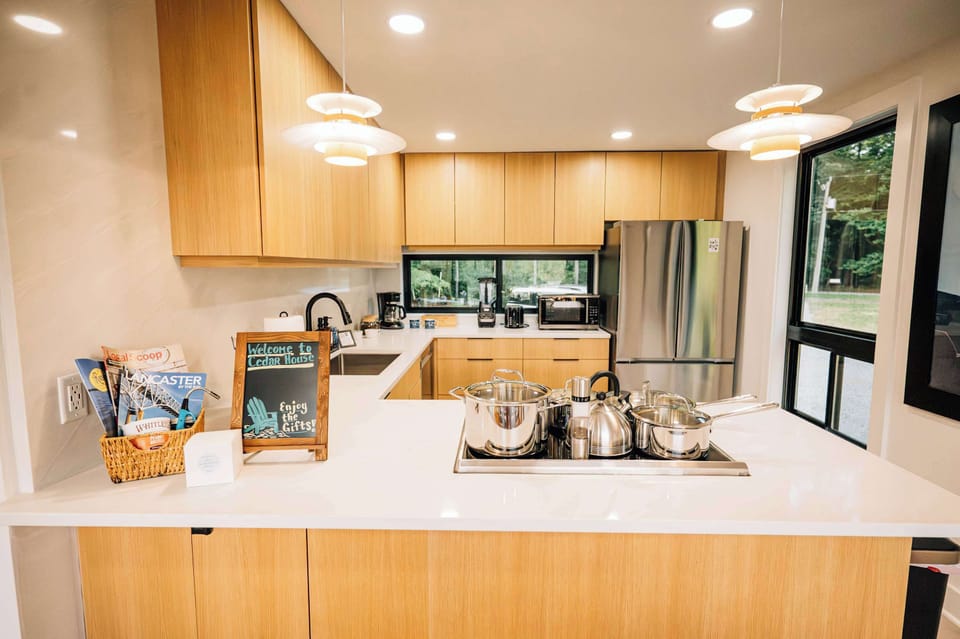The fully equipped kitchen combines modern design with everything needed for memorable meals and gatherings.