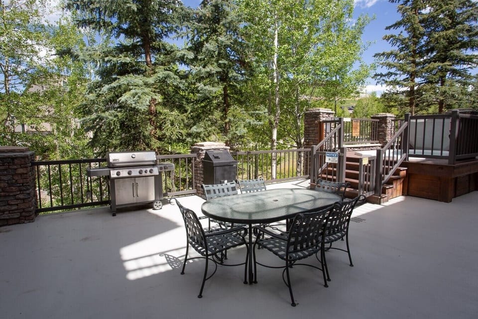 Black Bear Lodge community grills and outdoor dining table.