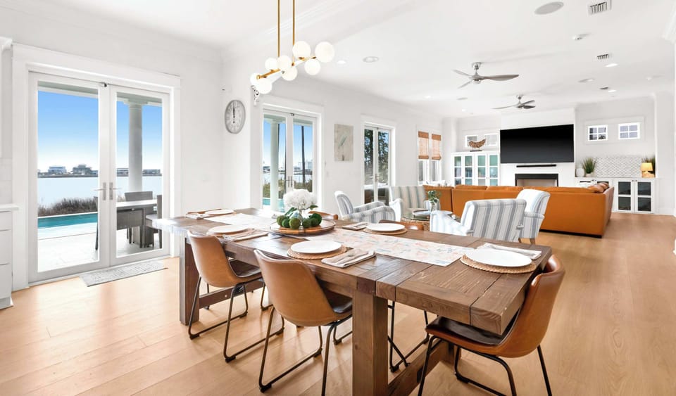 Dining area: Table seating for 6, breakfast bar with 4 stools