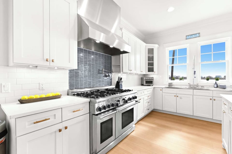 Kitchen: Drip coffee maker, Keurig, blender, kettle, toaster oven, tableware