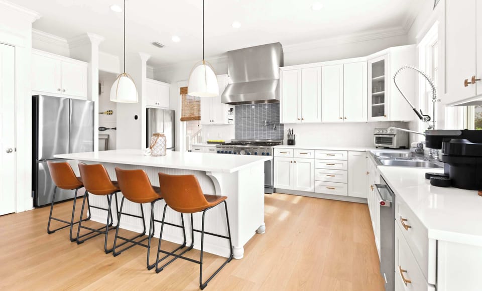 Kitchen: Drip coffee maker, Keurig, blender, kettle, toaster oven, tableware