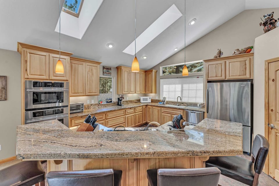 Kitchen: Drip coffee maker, air fryer, Crockpot, blender, kettle, toaster oven, tableware