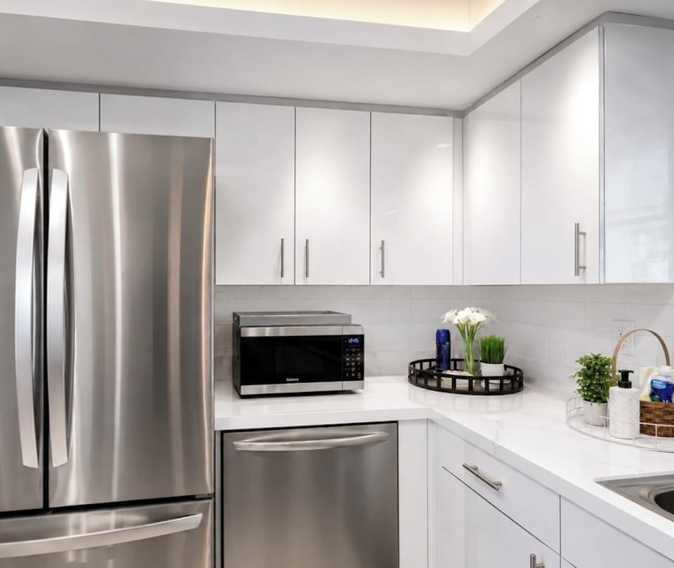 Modern kitchen with stainless steel appliances—perfect for families.