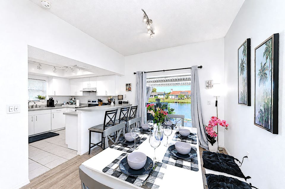 Fully equipped kitchen with a breakfast bar—ideal for active beach families.