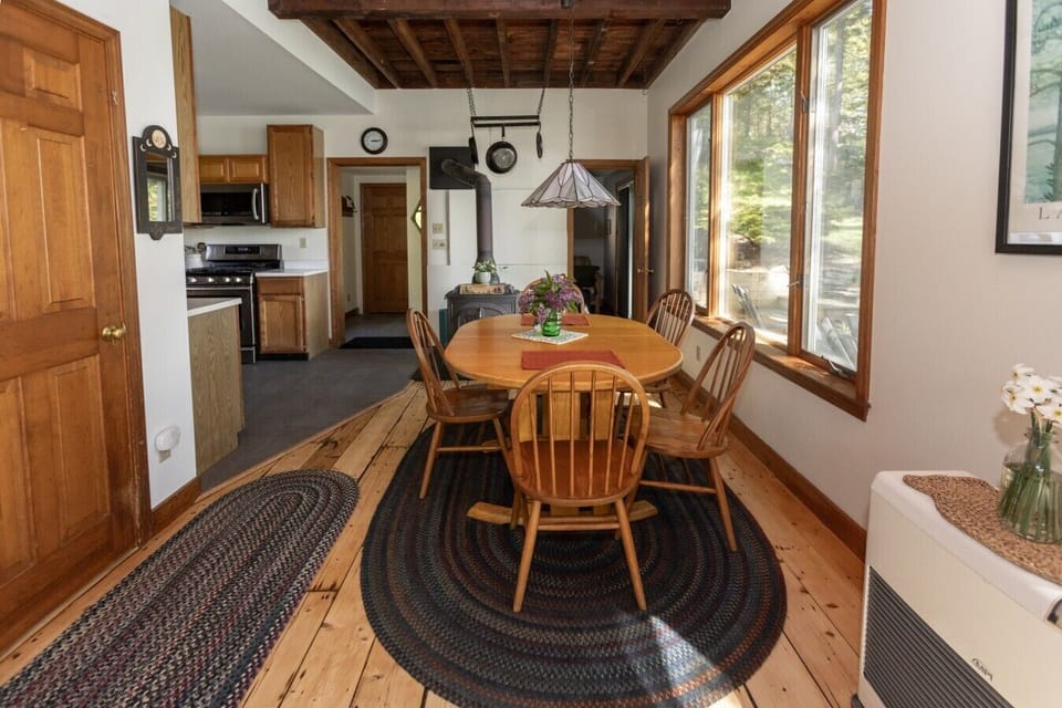 Cute dining area with seating for five