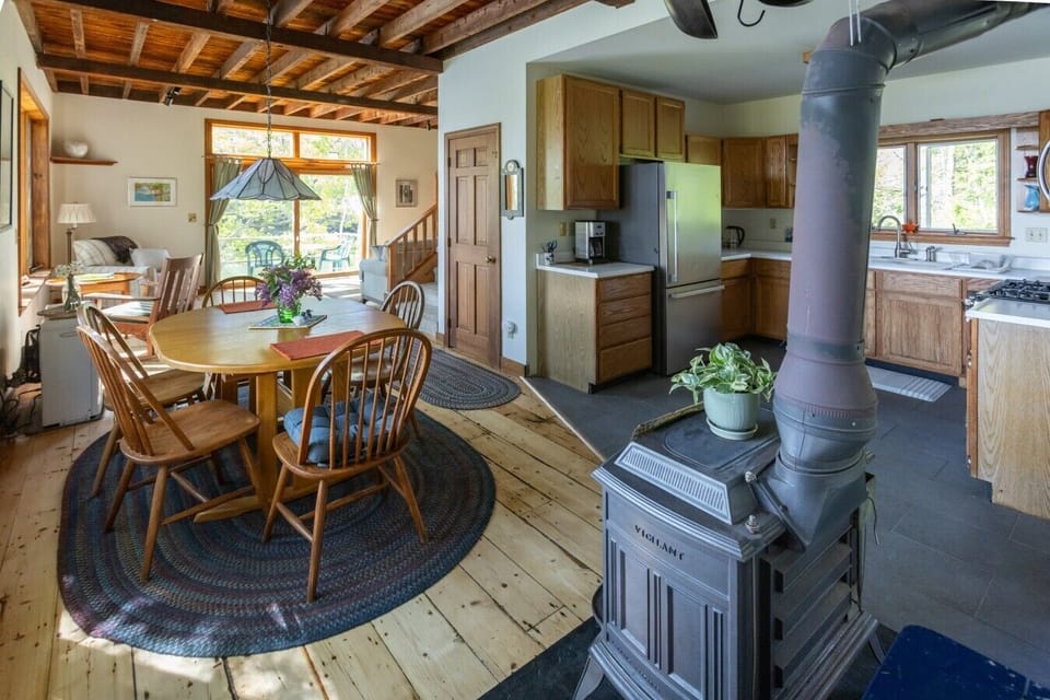 Open concept kitchen and dining area with beautiful natural light
