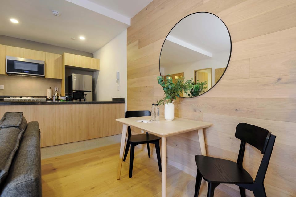 Modern dining area beside the kitchen.