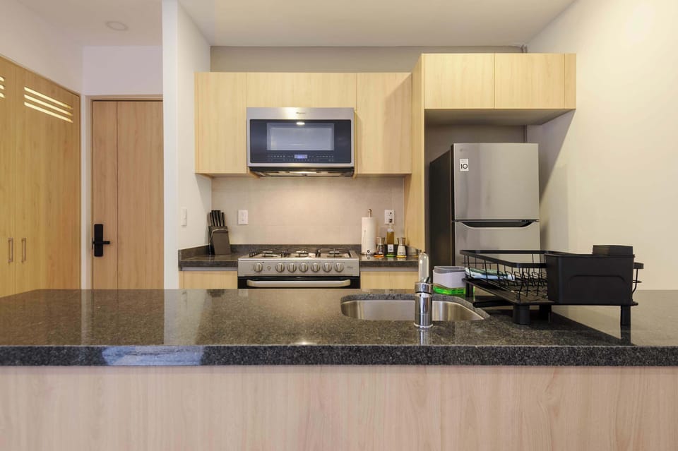 Fully equipped kitchen for home-cooked meals.