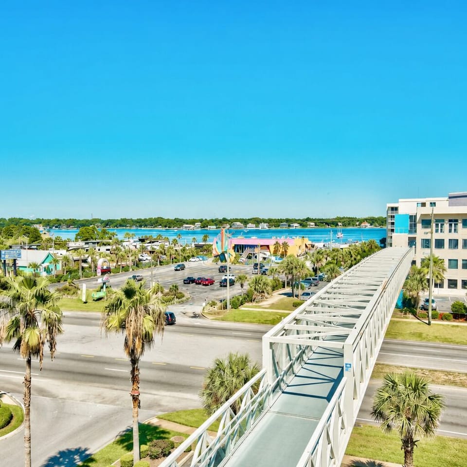 Convenient Sky Bridge provides easy access to the beautiful Emerald Coast Beach