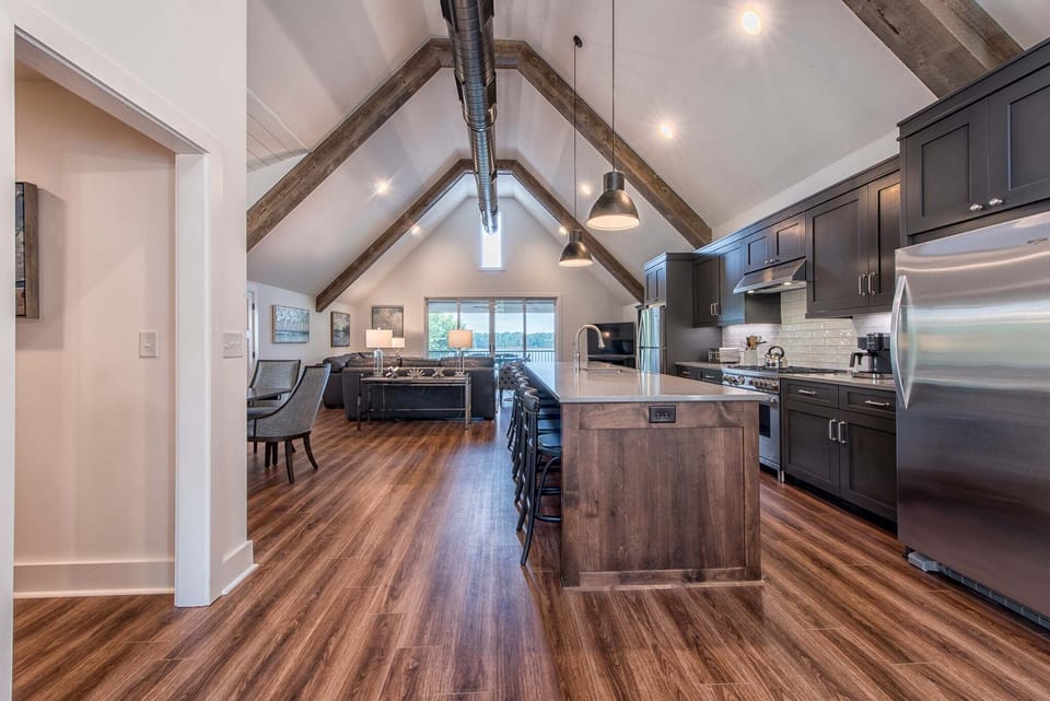 The Cottage-Upper level with open concept living with kitchen, living and dining areas.