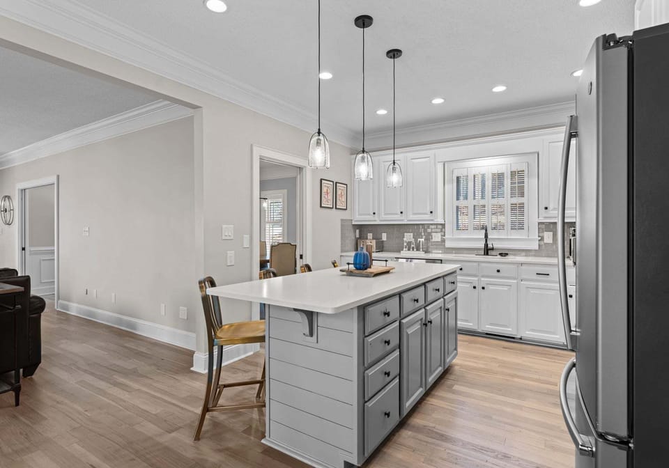 Remolded, fully stocked kitchen with new appliances and counter tops.