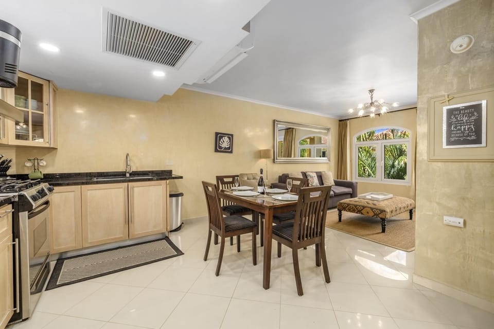 Open dining and kitchen layout designed for relaxing and entertaining.