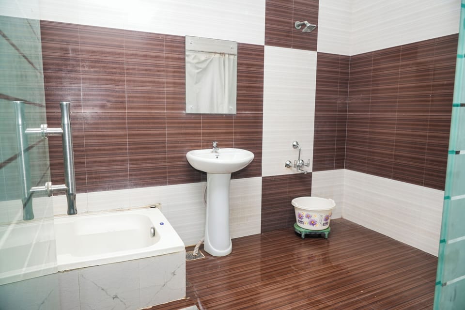 Basic Suite, City View | Bathroom | Shower, towels, soap