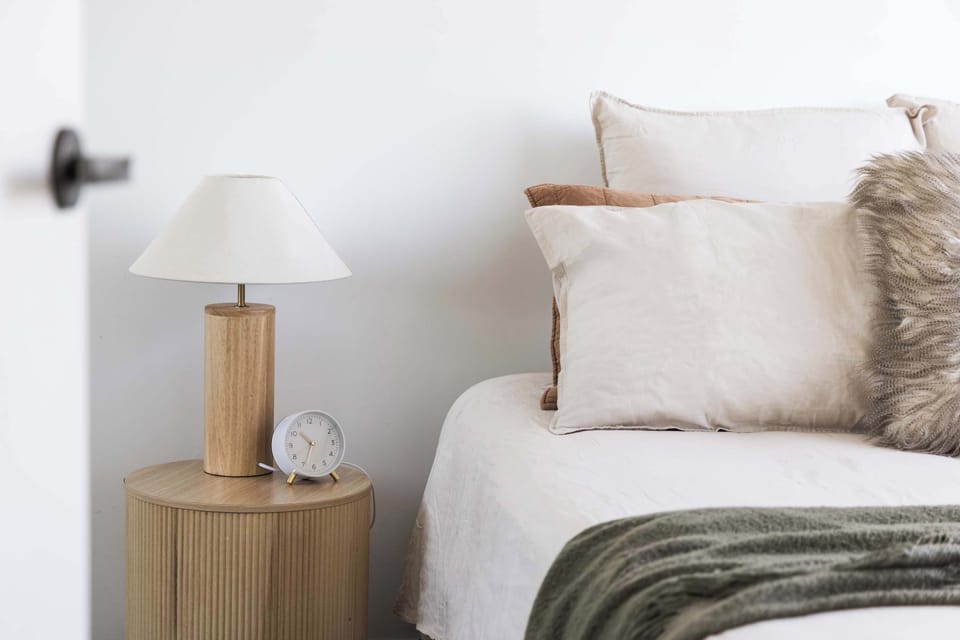 Thoughtful details and quality linen create a relaxed, coastal-luxe atmosphere throughout the bedrooms.