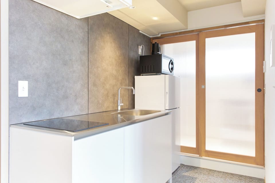 Apartment (801) | Private kitchen | Fridge, microwave, stovetop, cookware/dishes/utensils