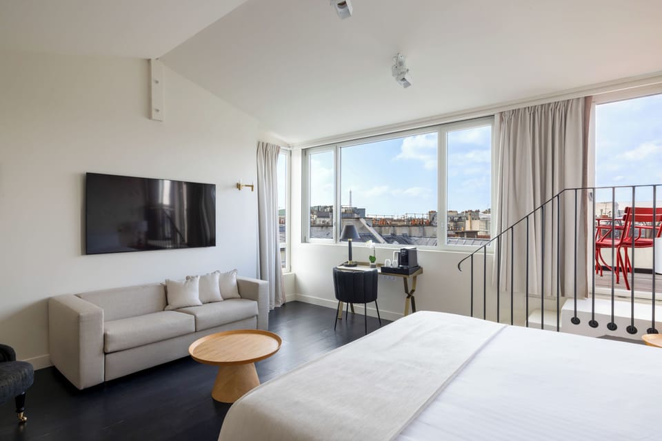 Privilege Room, Terrace, Eiffel Tower, with soft minibar, courtesy tray,Chromecast,digital press | Minibar, in-room safe, desk, blackout drapes