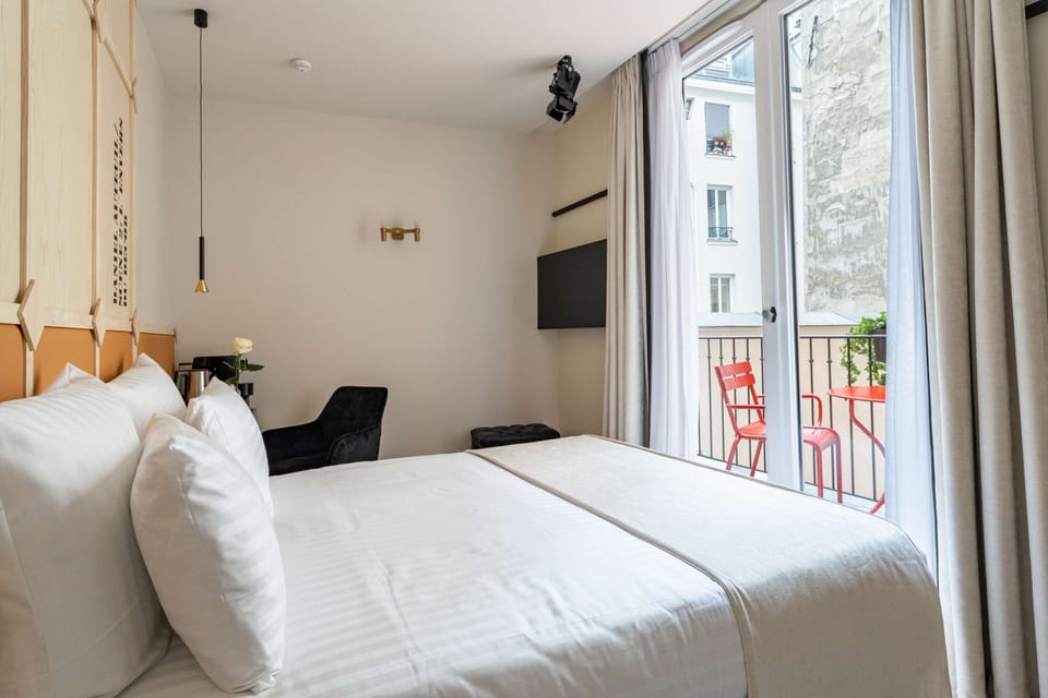 Double Room Terrace - Complimentary soft minibar, courtesy tray, Chromecast and digital press | Minibar, in-room safe, desk, blackout drapes