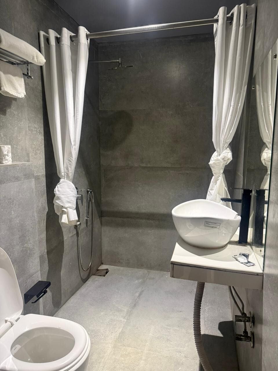 Shower, towels, soap, shampoo