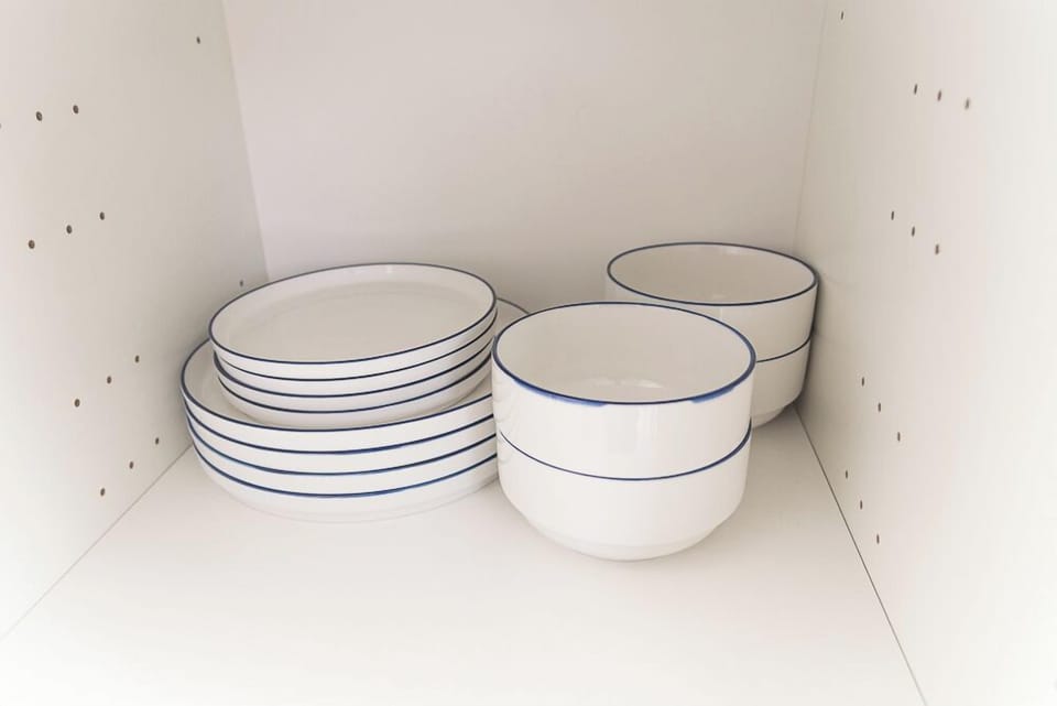 Plates and bowls are fully stocked for the whole group — no need to bring a thing.