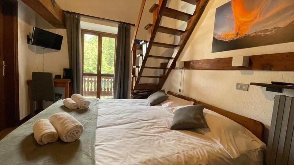 Standard Triple Room, Garden View | Desk, laptop workspace, free WiFi, wheelchair access
