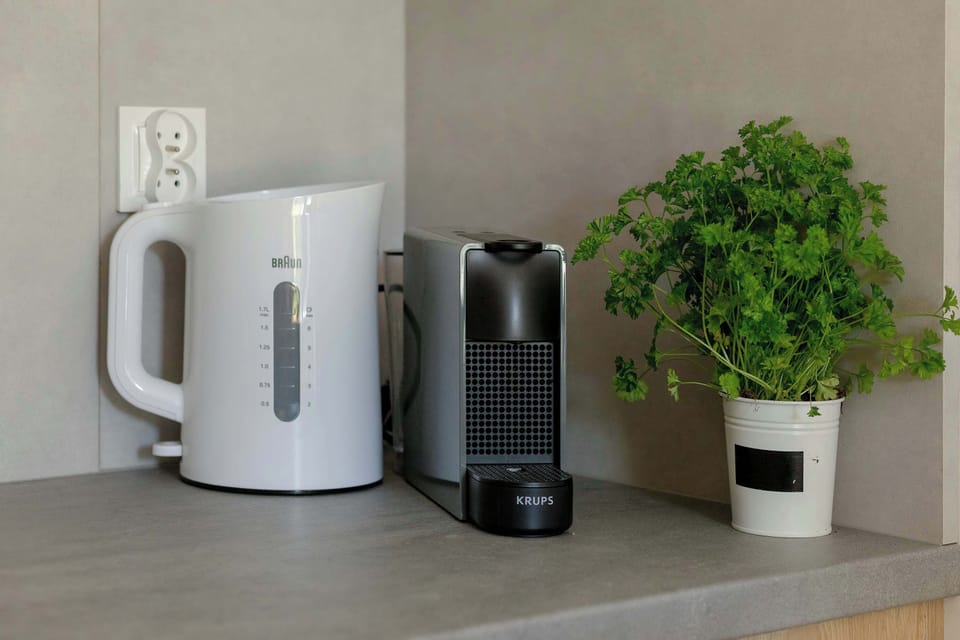 Cook and dine in style with the modern kitchenette and dining area.