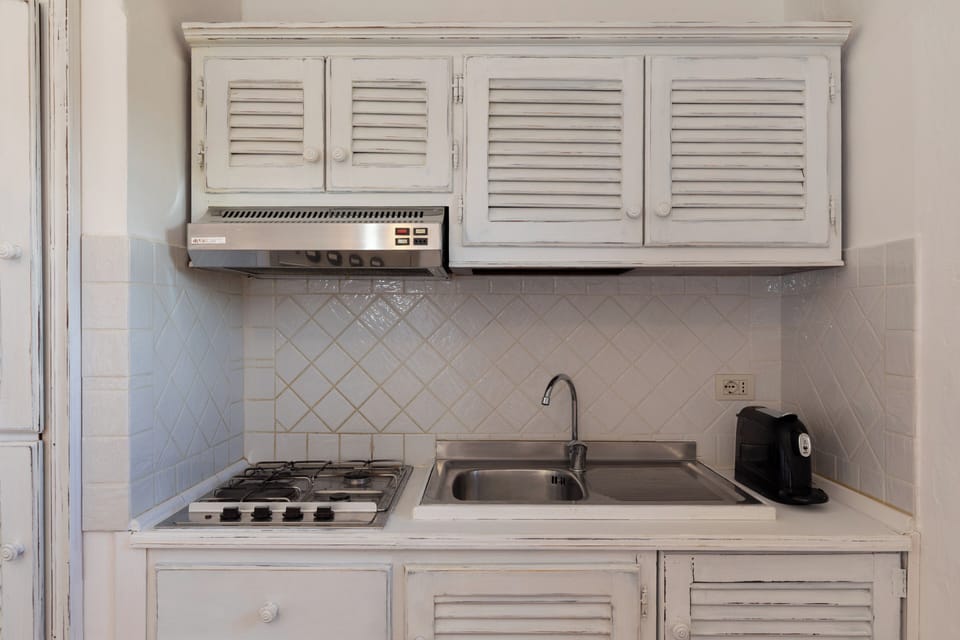 Apartment, 1 Bedroom, Sea View | Private kitchen | Espresso maker, coffee/tea maker