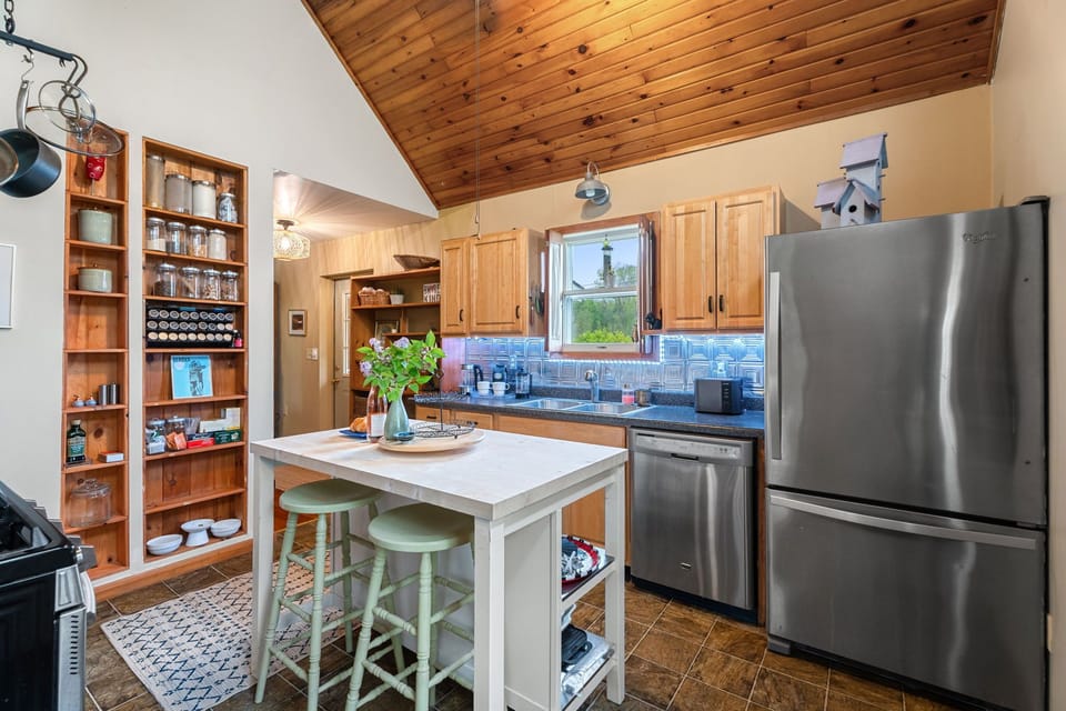 Fully stocked kitchen with rustic charm and everything needed for relaxed meals in.