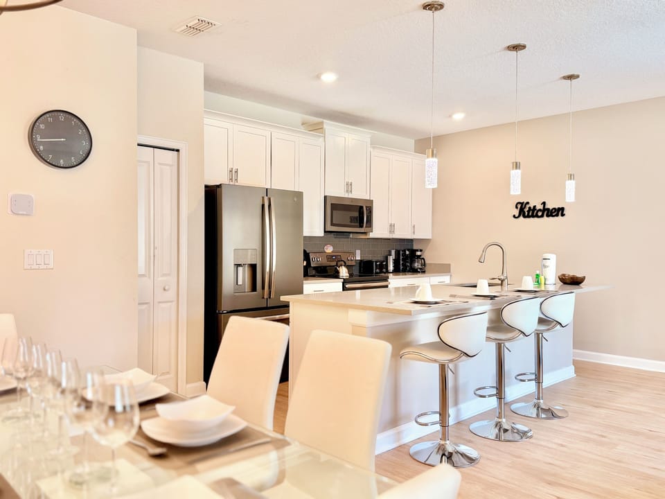 From a quick snack to a set dinner, this bright kitchen is built for memories