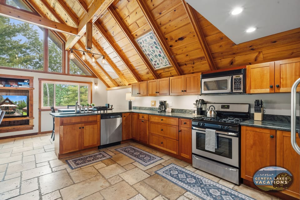 Kitchen with stove, microwave and dish washer