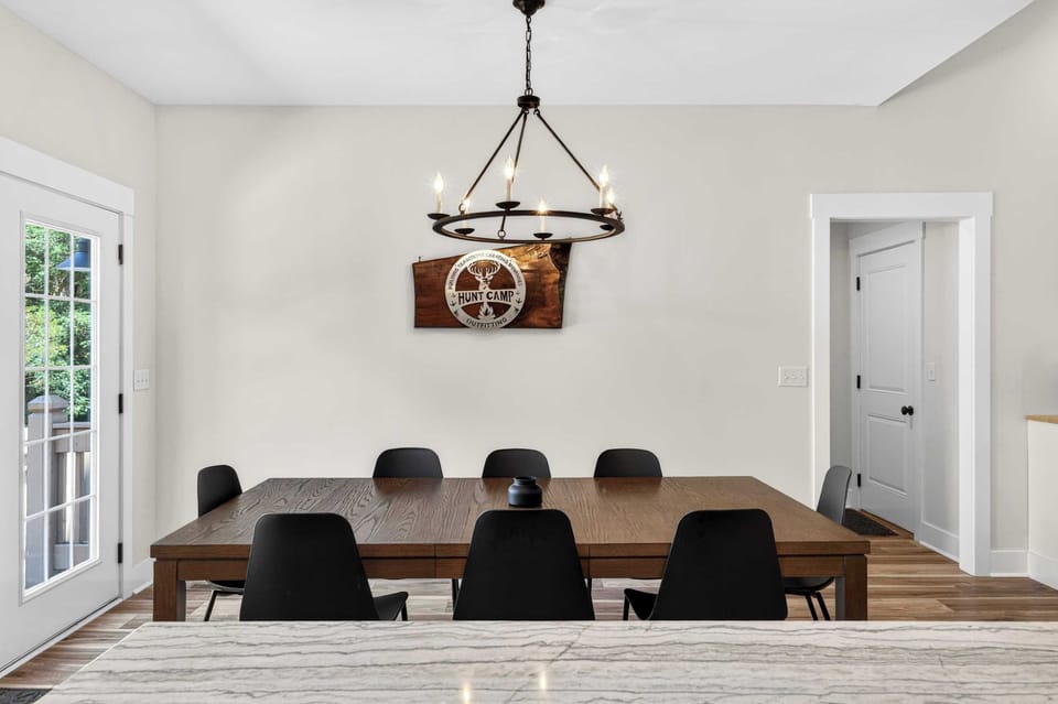 Dining Area 2: This spacious dining area offers comfortable seating for your group, making it the perfect place for family dinners, game nights, or morning coffee.