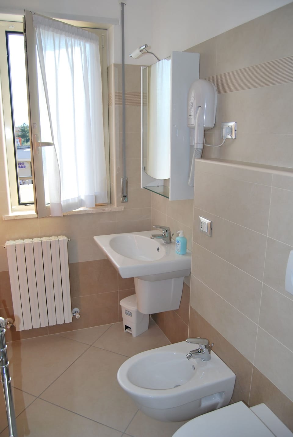 Free toiletries, hair dryer, bidet, towels
