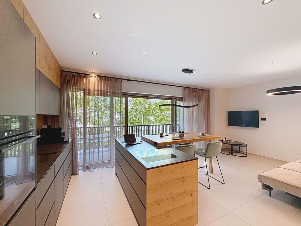 Interior Design, Flooring, Furniture, Wood, Ceiling, Countertop, Kitchen, Floor, Light Fixture, Cabinetry