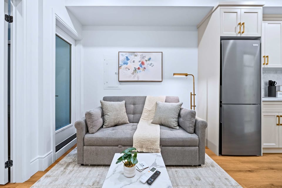 Cozy living area with a sofa bed, perfect for relaxing or extra guests.