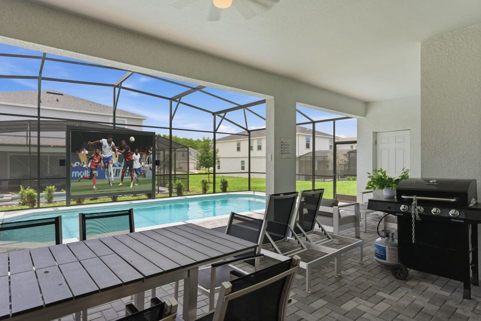 Patio with private pool and summer kitchen