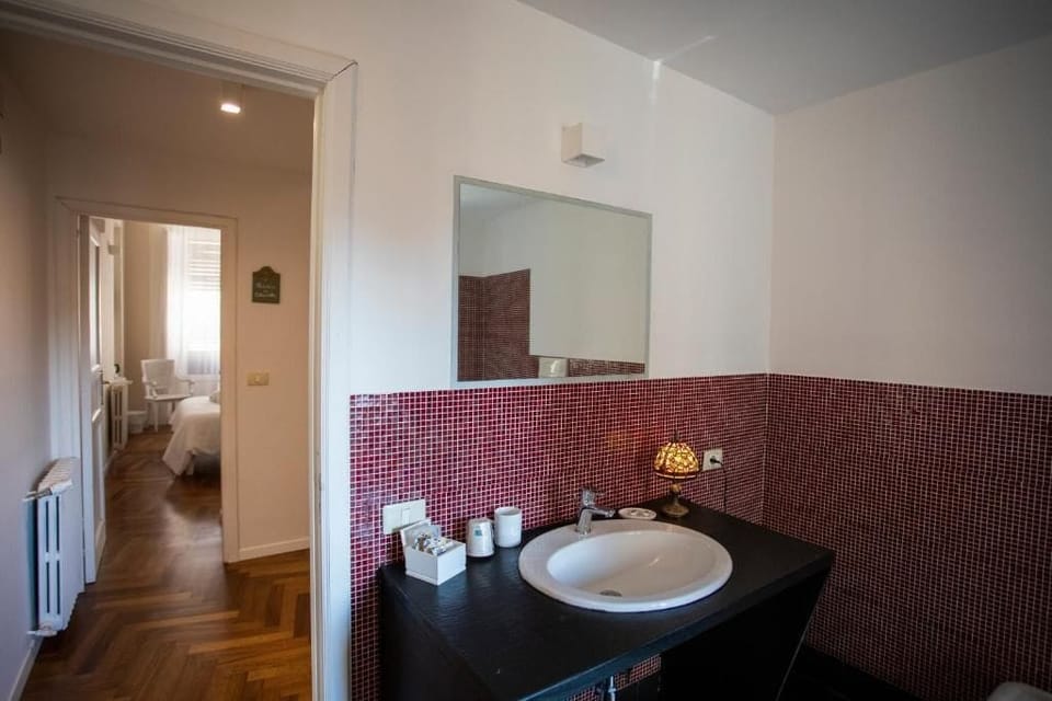 Economy Double Room, Balcony, City View | Bathroom | Bathrobes, slippers